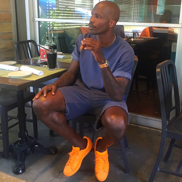 Chad Johnson wearing the "Orange" adidas Superstar Supercolor
