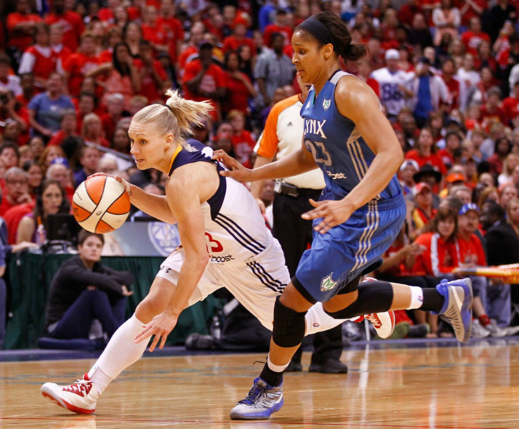 Erin Phillips wearing Under Armour Micro G Torch