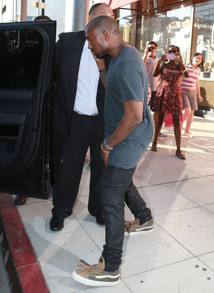 Kanye West wearing WTAPS x Vans Vault Sk8-Hi Olive (4)