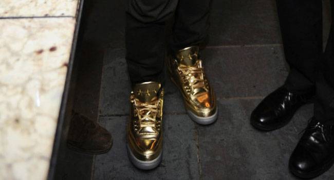Usher wearing Air Jordan 3 Gold