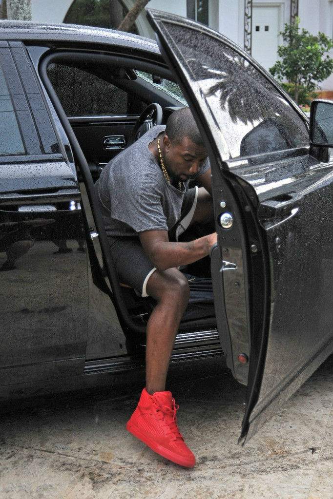 Kanye West wearing Balenciaga Cotes High Red (5)