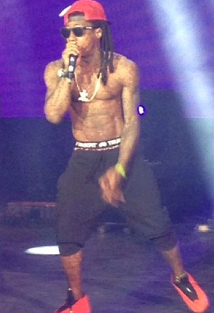 Lil' Wayne wearing Air Jordan XIV 14 Ferrari