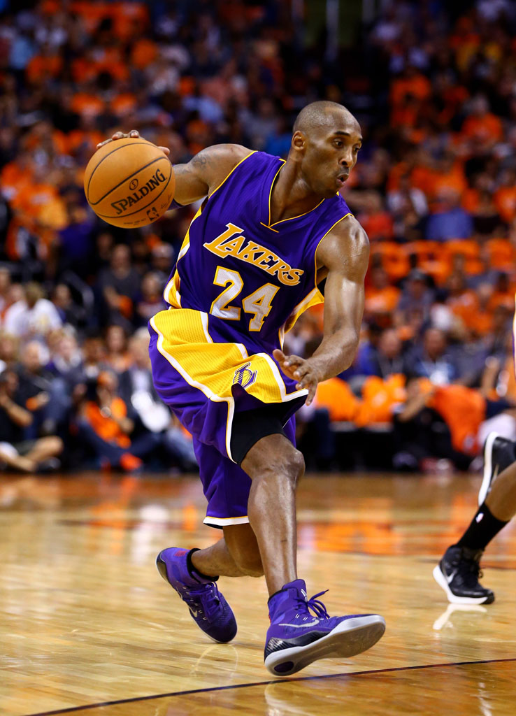 Kobe Bryant wearing Nike Kobe 9 Elite Purple PE
