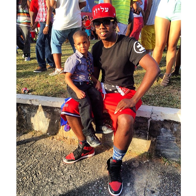 Trinidad James wearing Air Jordan 1 Retro Black/Red