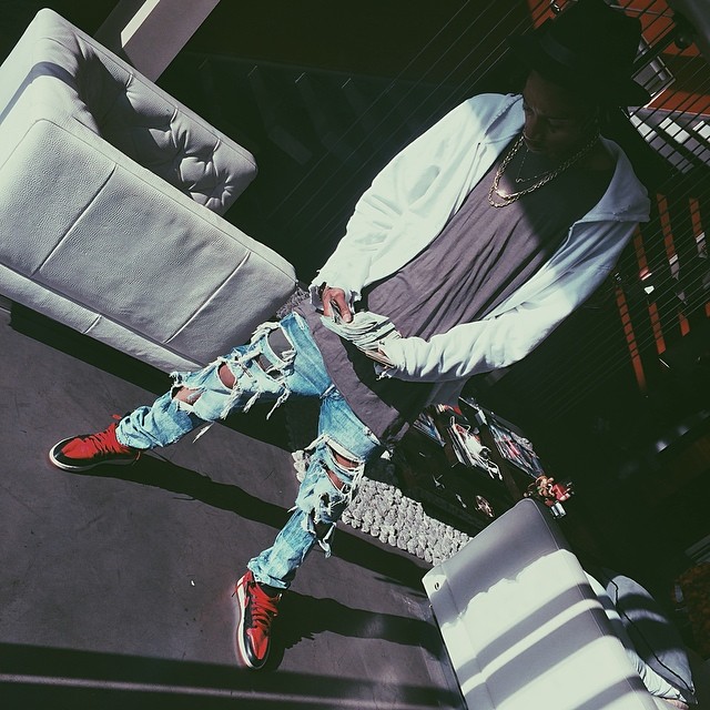 Wiz Khalifa wearing Air Jordan I 1 Retro Black/Red