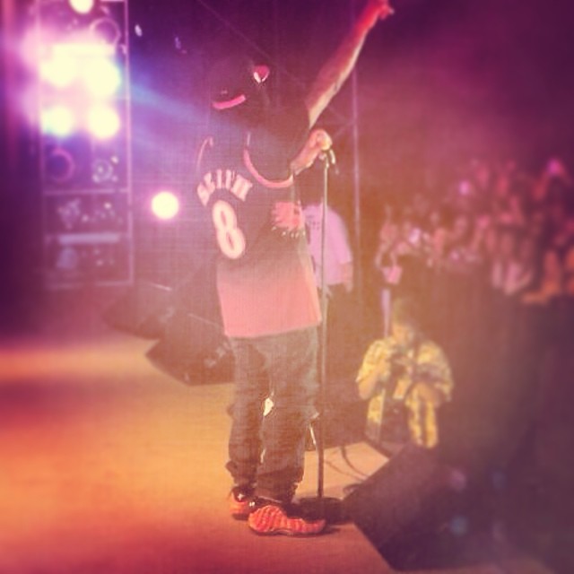 Wale wearing Supreme x Nike Air Foamposite One Red