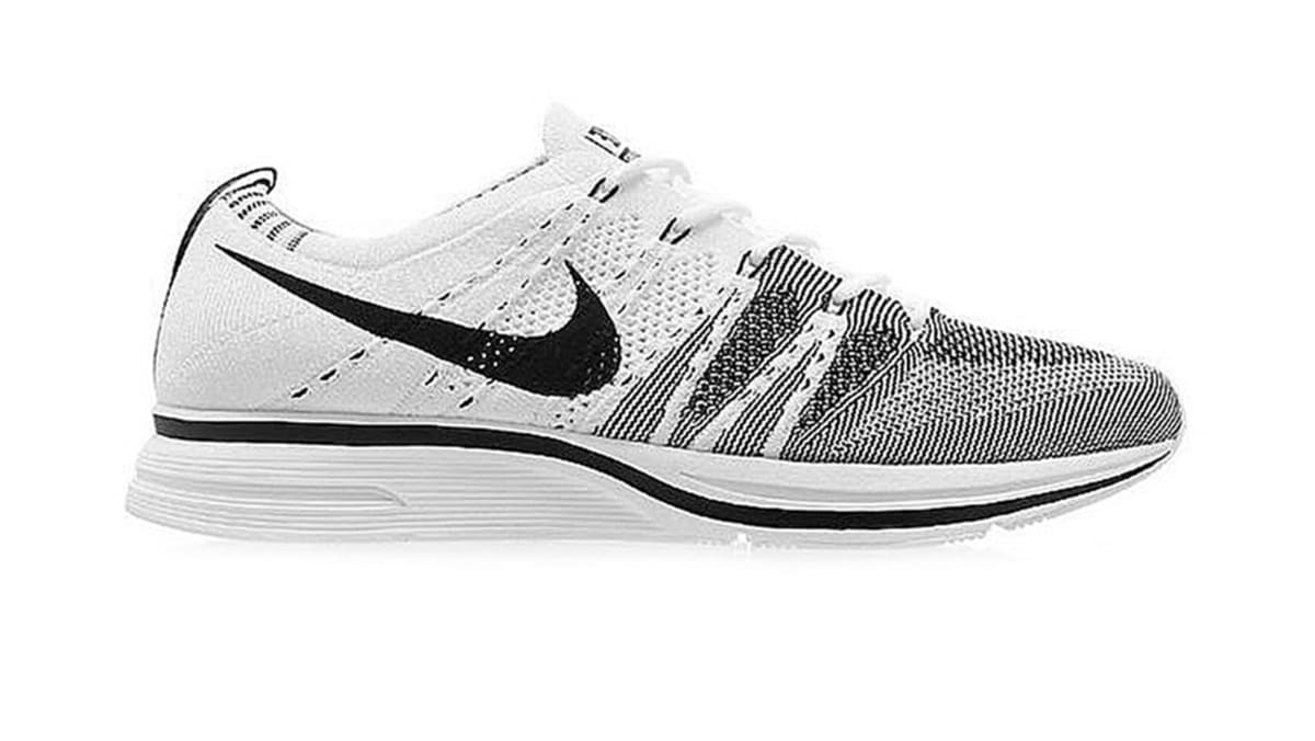 black trainers with white soles