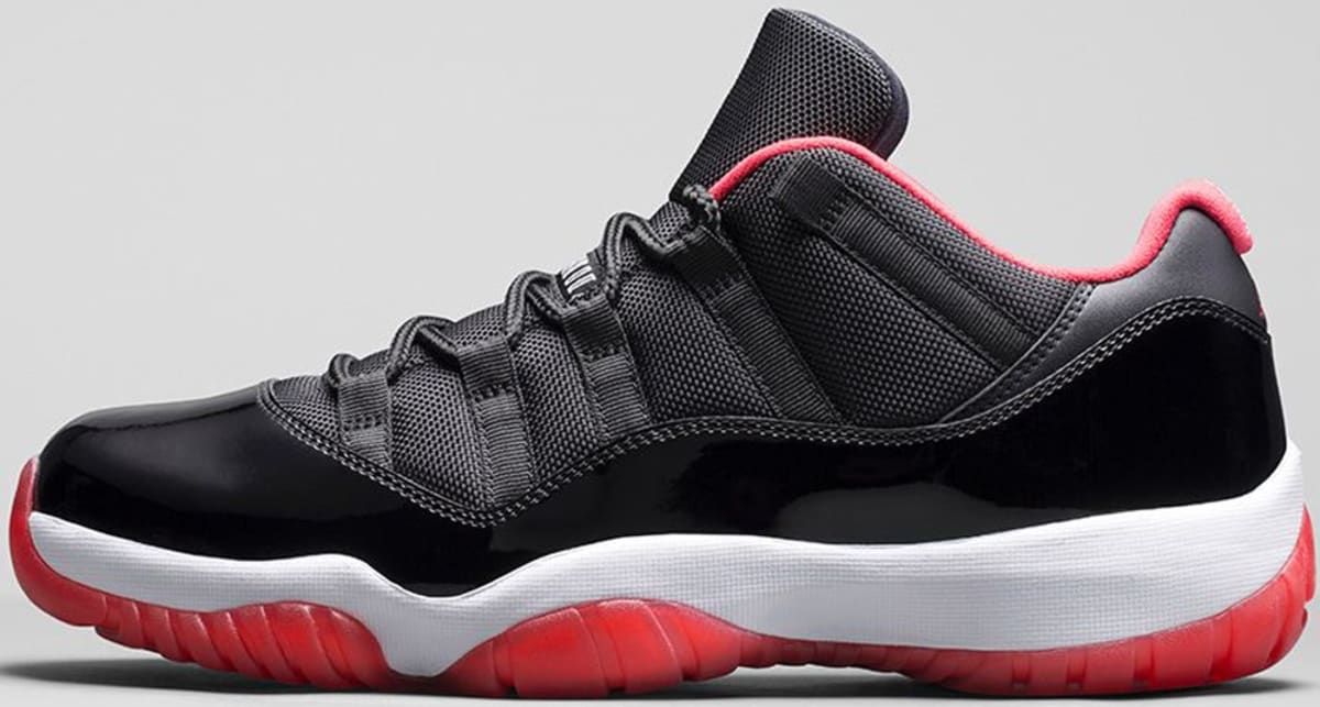 red black and white low top jordans 11