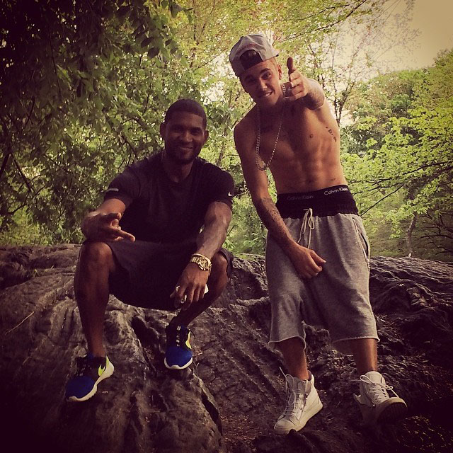 Usher wearing Nike Roshe Run Hyperfuse Magista; Justin Bieber wearing Giuseppe Zanotti Sneakers