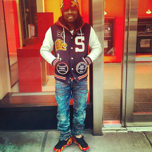 Wale wearing Nike Air Foamposite One Supreme Red