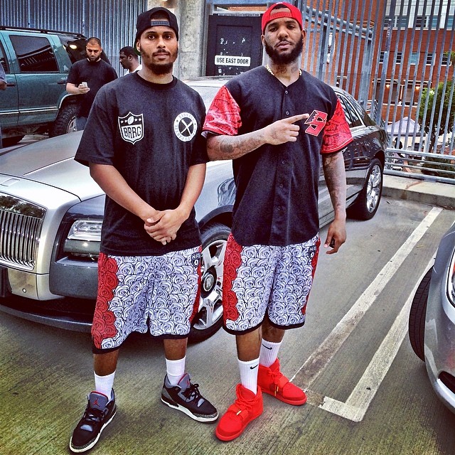 The Game wearing Nike Air Yeezy II 2 Red October