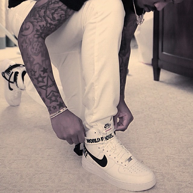 Future wearing Supreme x Nike Air Force 1 High White