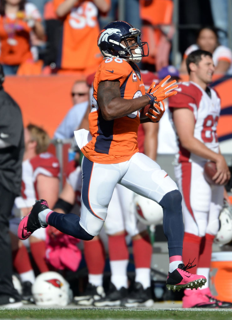 Demaryius Thomas wearing Nike Lunar Superbad Pro Low Breast Cancer Awareness Pink Cleats