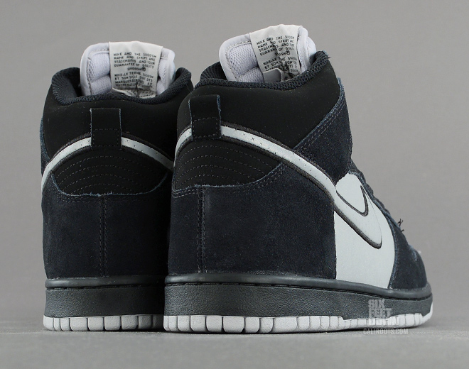 Nike Dunk High in black and reflective silver heel detail