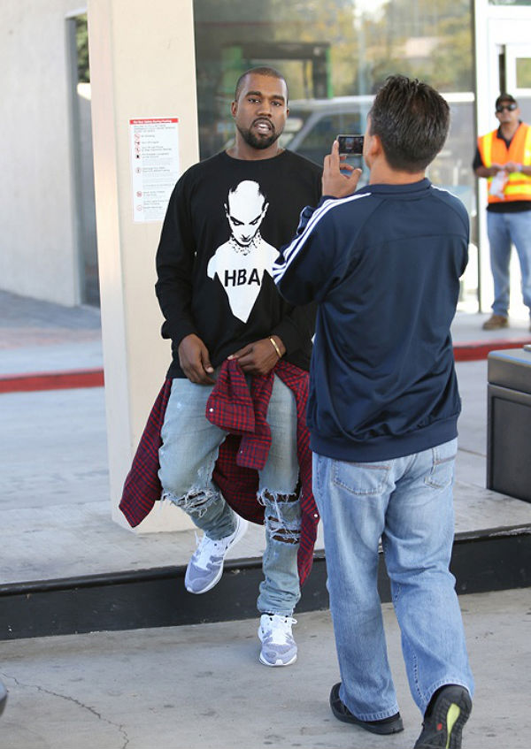 Kanye West wearing Nike Flyknit Trainer