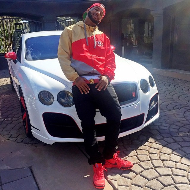The Game wearing Nike Kyrie 1 Deceptive Red