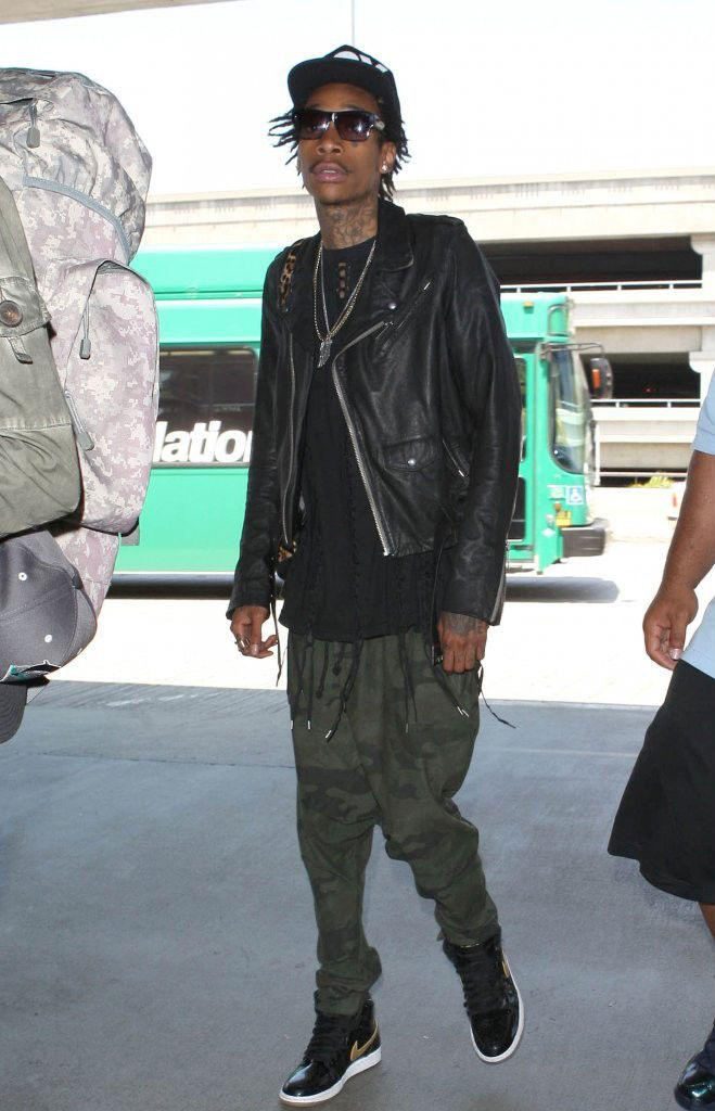 Wiz Khalifa wearing Air Jordan Retro I 1 Black Gold (1)