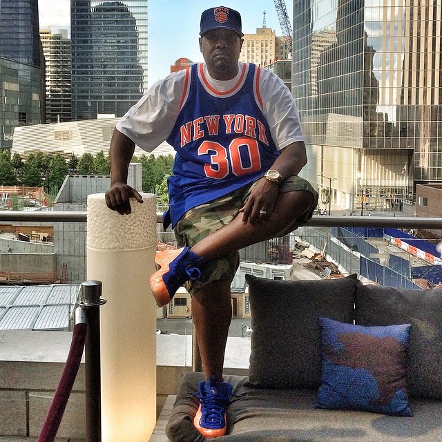 DJ Clark Kent wearing Nike Air Foamposite One Knicks