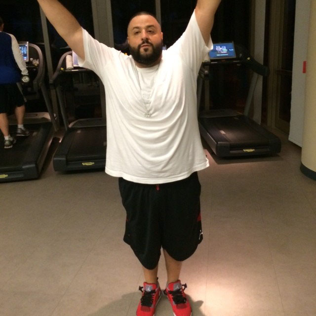 DJ Khaled wearing Air Jordan 4 Retro Toro