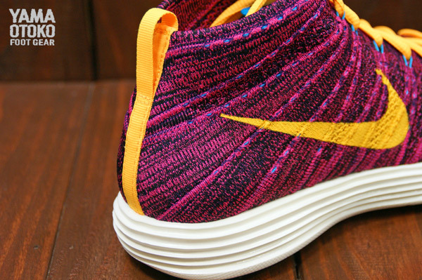 Nike Flyknit Chukka laser orange grand purple heel