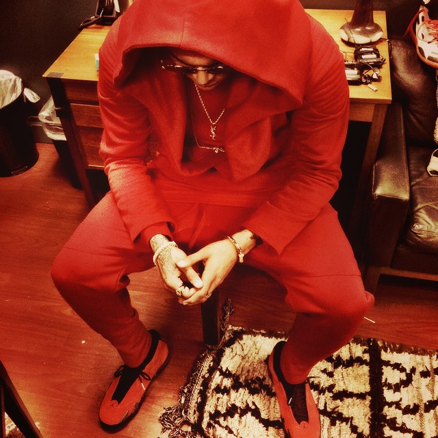 Chris Brown wearing Air Jordan XIV 14 Ferrari