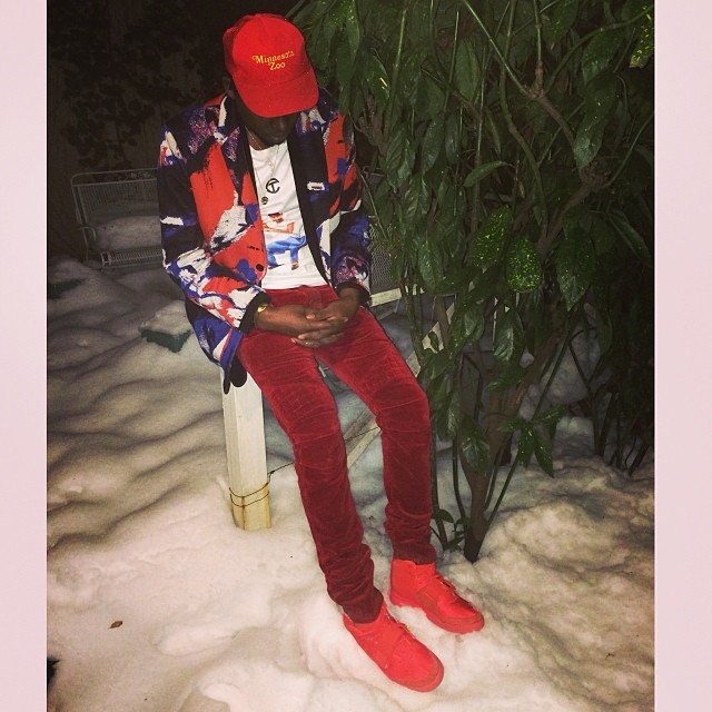Theophilus London wearing Nike Air Yeezy 2 Red October