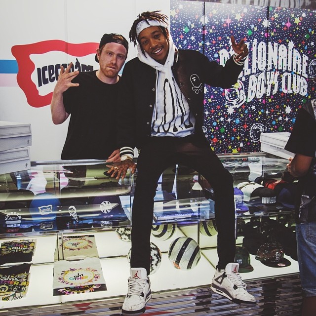Wiz Khalifa wearing Air Jordan IV 4 Cement
