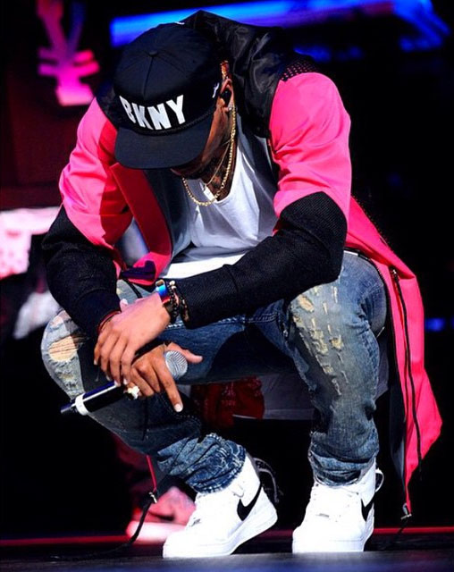 Chris Brown wearing Supreme x Nike Air Force 1 High