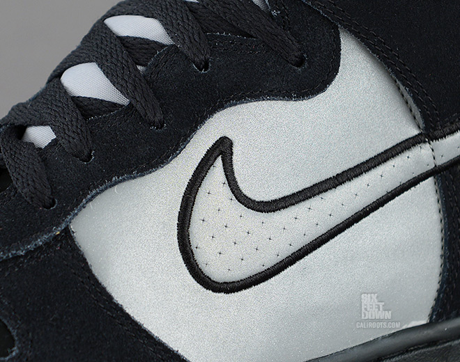 Nike Dunk High in black and reflective silver midfoot detail