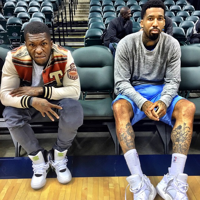 Nate Robinson wearing 'Billy Hoyle' Nike Air Command Force; Wilson Chandler wearing Pigalle x Nike Air Raid White