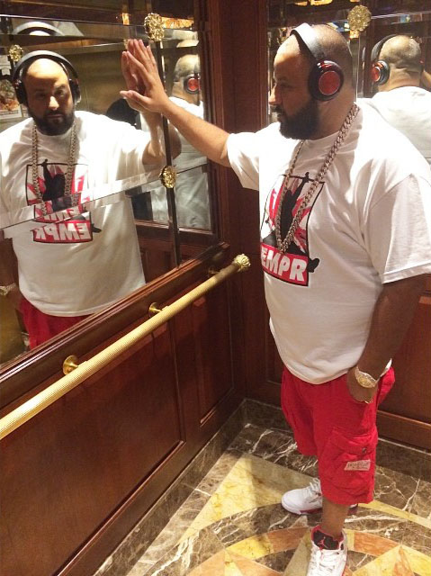 DJ Khaled wearing Air Jordan V 5 Fire Red