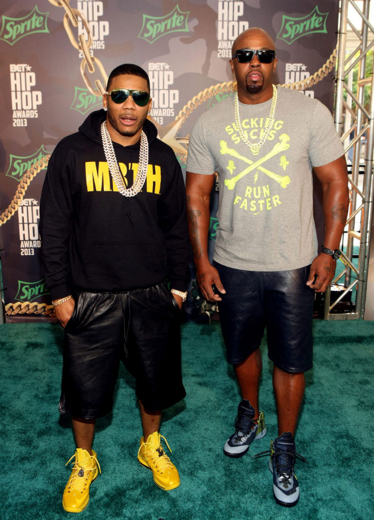 Nelly wearing Nike LeBron X Must Be The Honey; Ali wearing Nike Zoom Hyperenforcer XD
