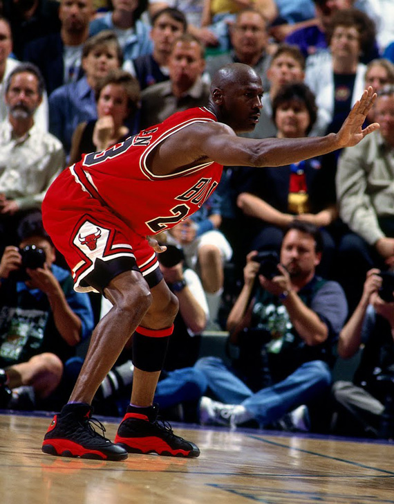 Michael Jordan wearing the 'Bred' Air Jordan 13