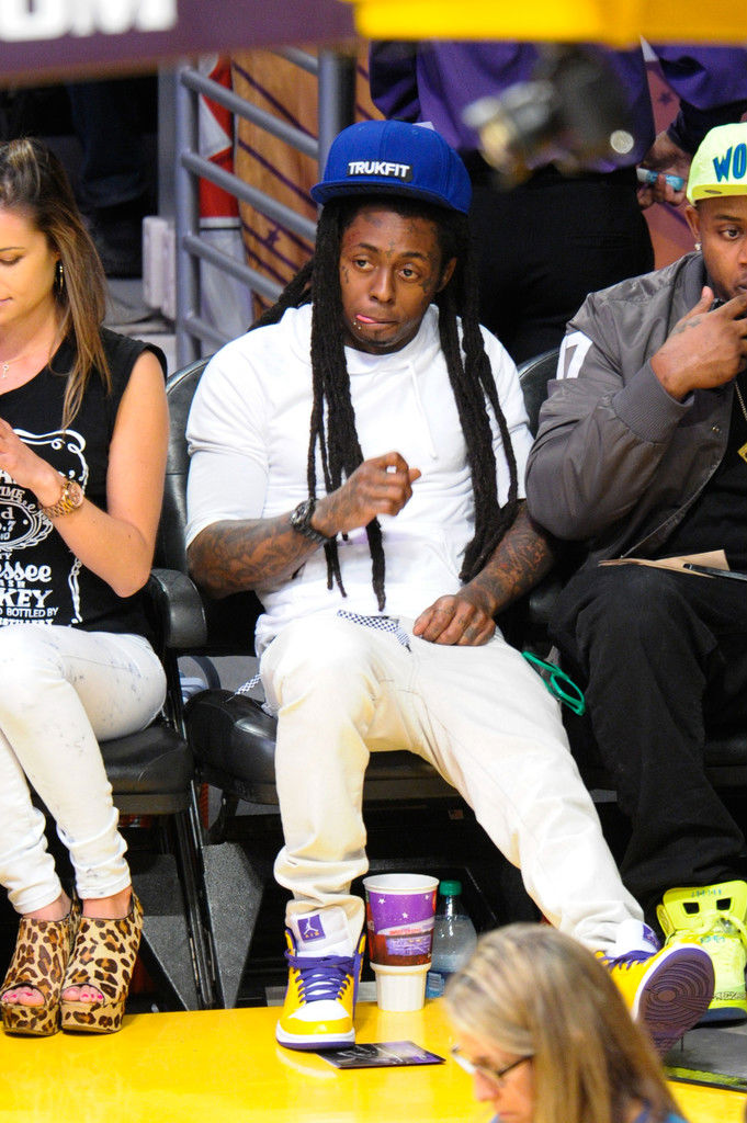 Lil' Wayne wearing Air Jordan 1 Mid Lakers (1)