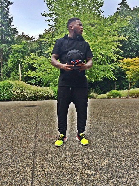Nate Robinson wearing Nike Roshe Run Hyperfuse Mercurial