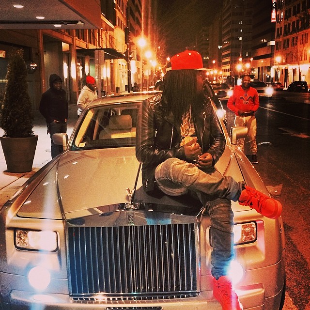 Wale wearing Nike Air Yeezy 2 Red October