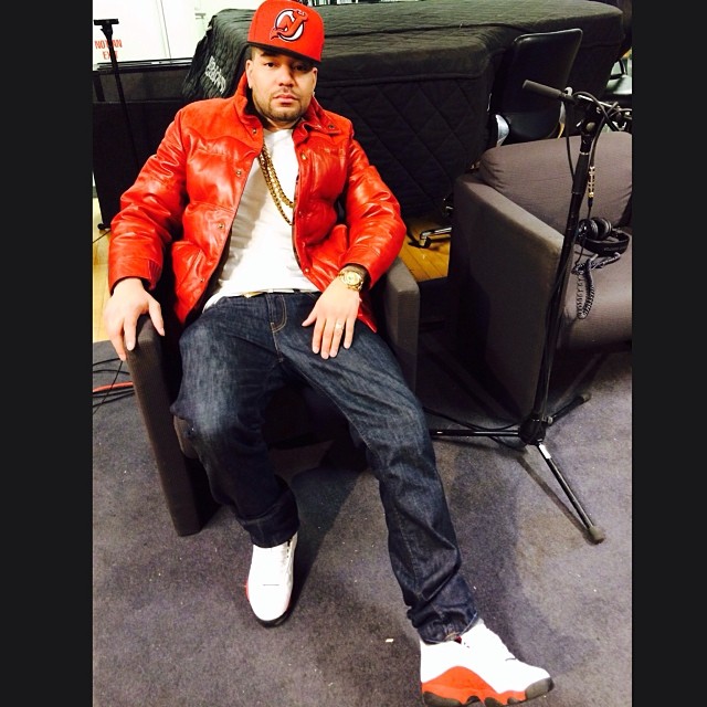 DJ Envy wearing Air Jordan 13 White/Red