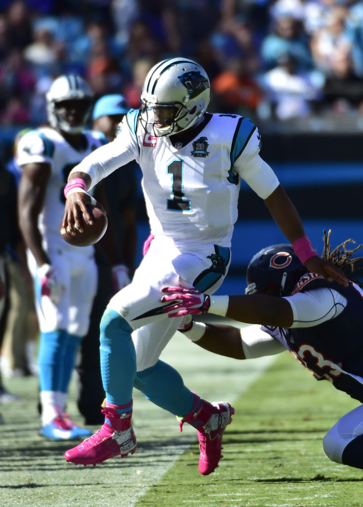 Cam Newton wearing Under Armour Breast Cancer Awareness Pink Cleats