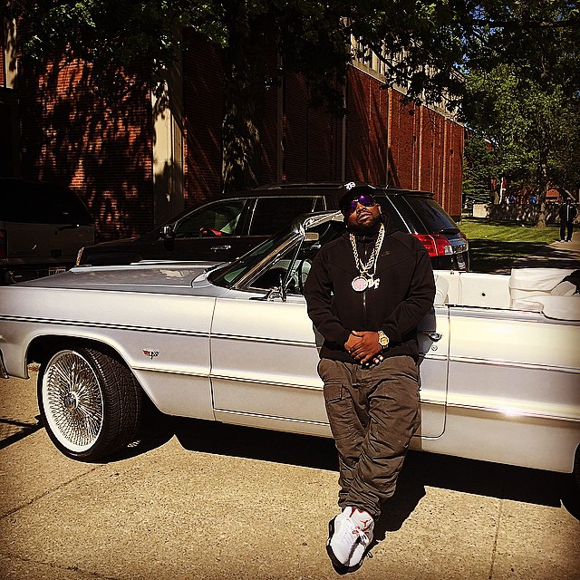 Big Boi wearing the 'Fire Red' Air Jordan V 5