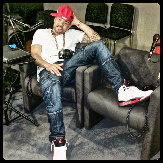 DJ Envy wearing Air Jordan V 5 Fire Red