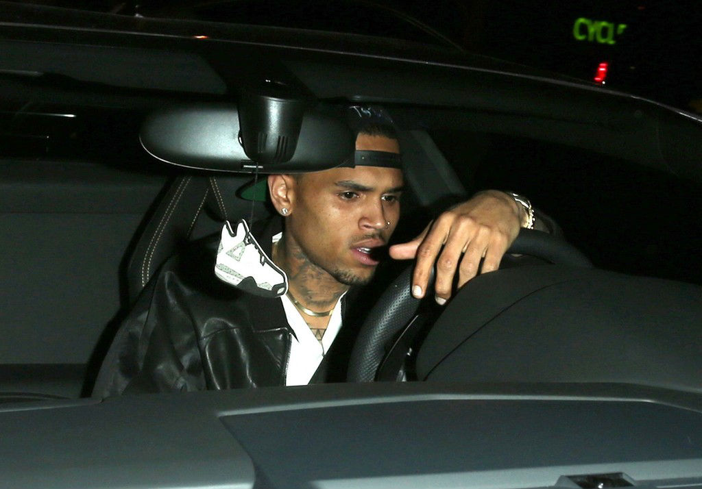Chris Brown Drives With Shoepreme Air Jordan IV Car Freshener Sole
