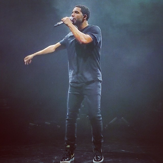 Drake wearing Air Jordan I 1 Black/Gold