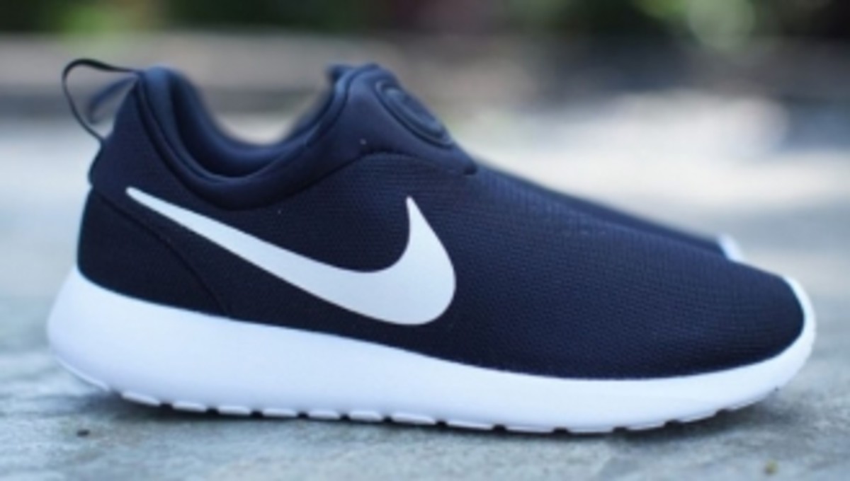 black leather sneaker with white sole