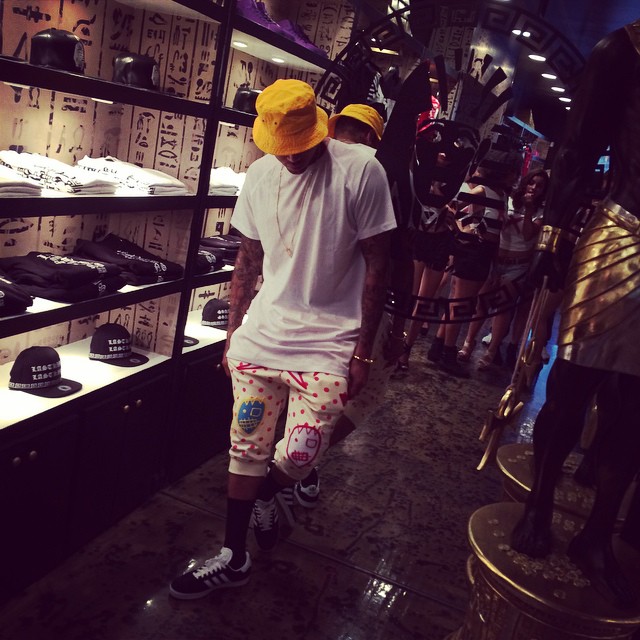 Chris Brown wearing adidas Originals Gazelle Black/White