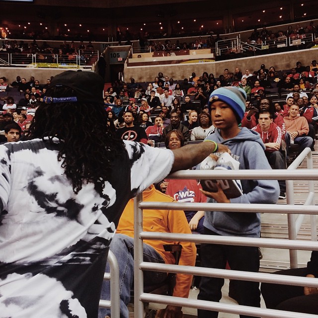 Wale Gives Air Jordans to a Wizards Fan (2)