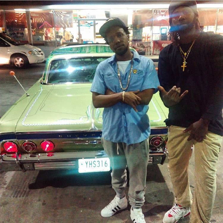 Currensy Wearing the adidas Pro Model
