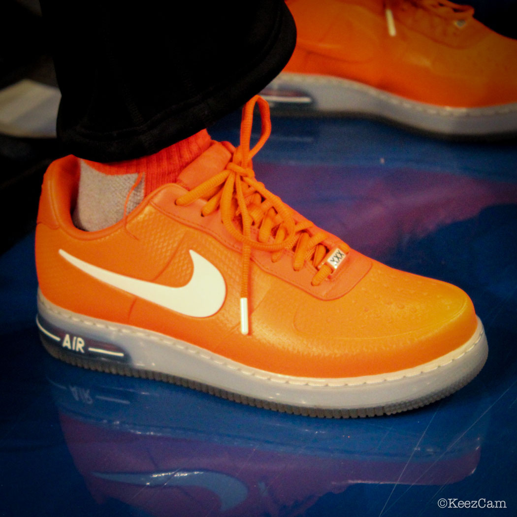 SoleWatch // Up Close At MSG for Pelicans vs Knicks - Spike Lee wearing Nike Air Force 1 Foamposite Low Orange