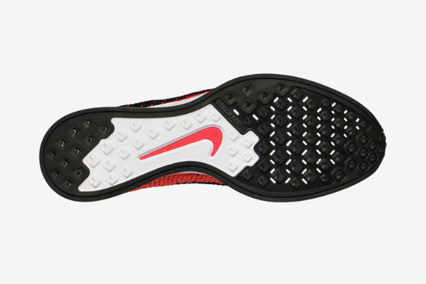 Nike Flyknit Racer in Black / Laser Crimson / Total Orange Outsole