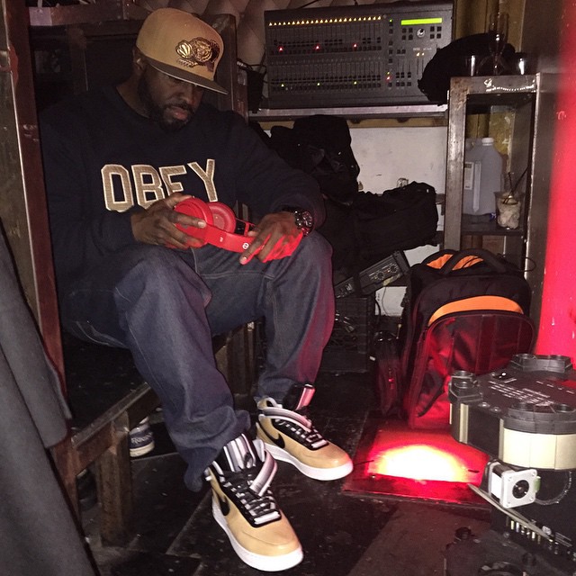 DJ Funk Flex wearing Nike Air Force 1 High RT Beige
