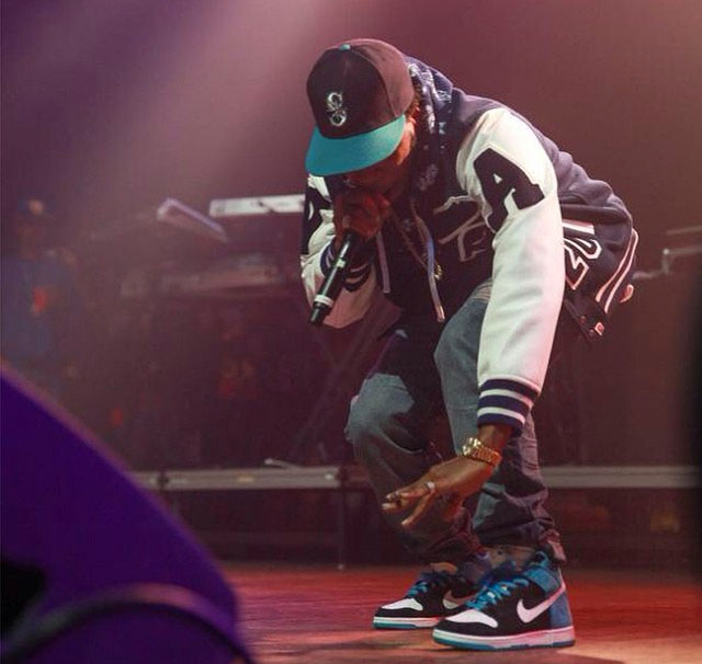 Currensy wearing Nike Dunk High SB Send Help